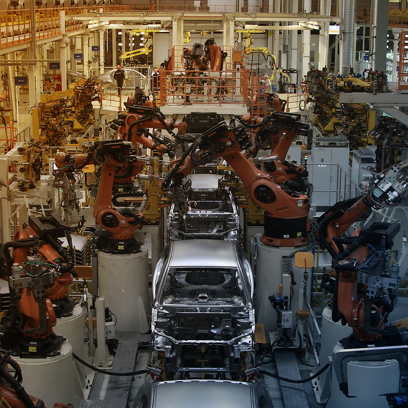 Assembly line production of cars photographed from above